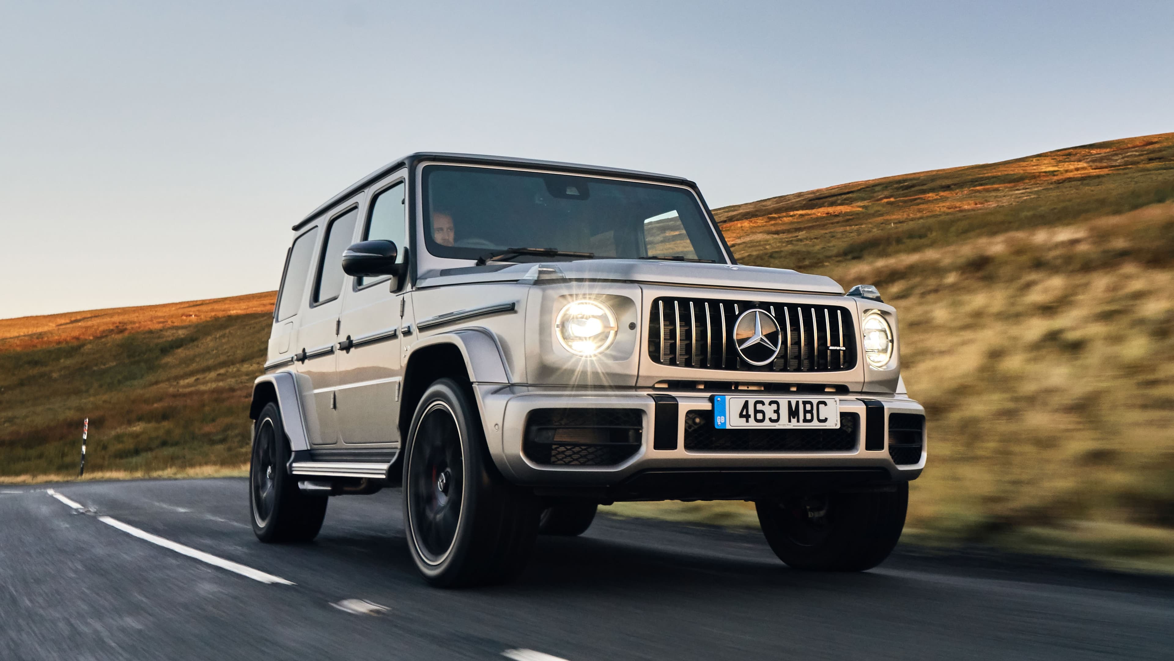 Consignment stock — a Mercedes G-Wagon on a moorland road